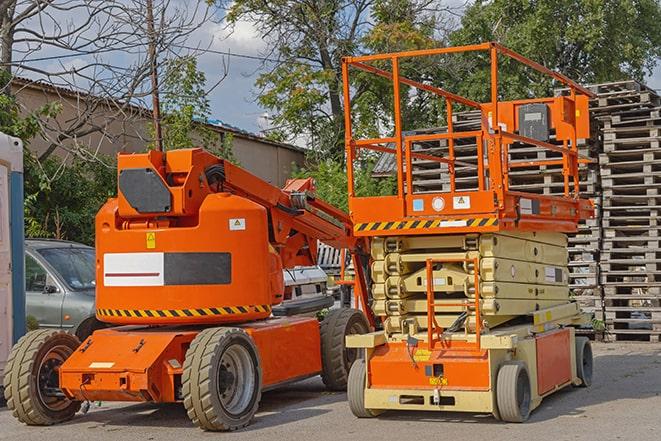 forklift in action at busy industrial warehouse in Benton, KS